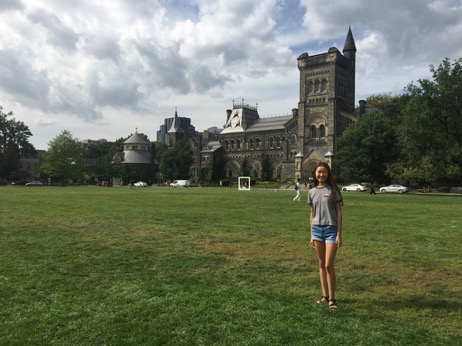 alt= Elizabeth standing in front of the University College building a couple days before the fall term starts